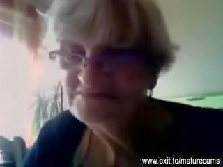 55 years old granny shows her big tits on cam Video